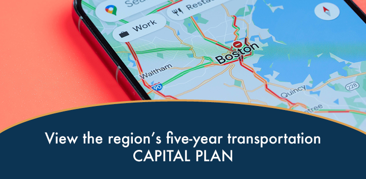 Close-up photograph of a smart phone showing traffic congestion on a map of the Boston area with text underneath reading "View the region's five-year rolling capital plan"